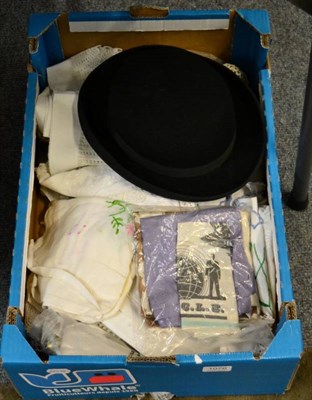 Lot 1076 - A quantity of textiles to include a Christening gown; a 1930s wedding hat; embroidered cloths;...