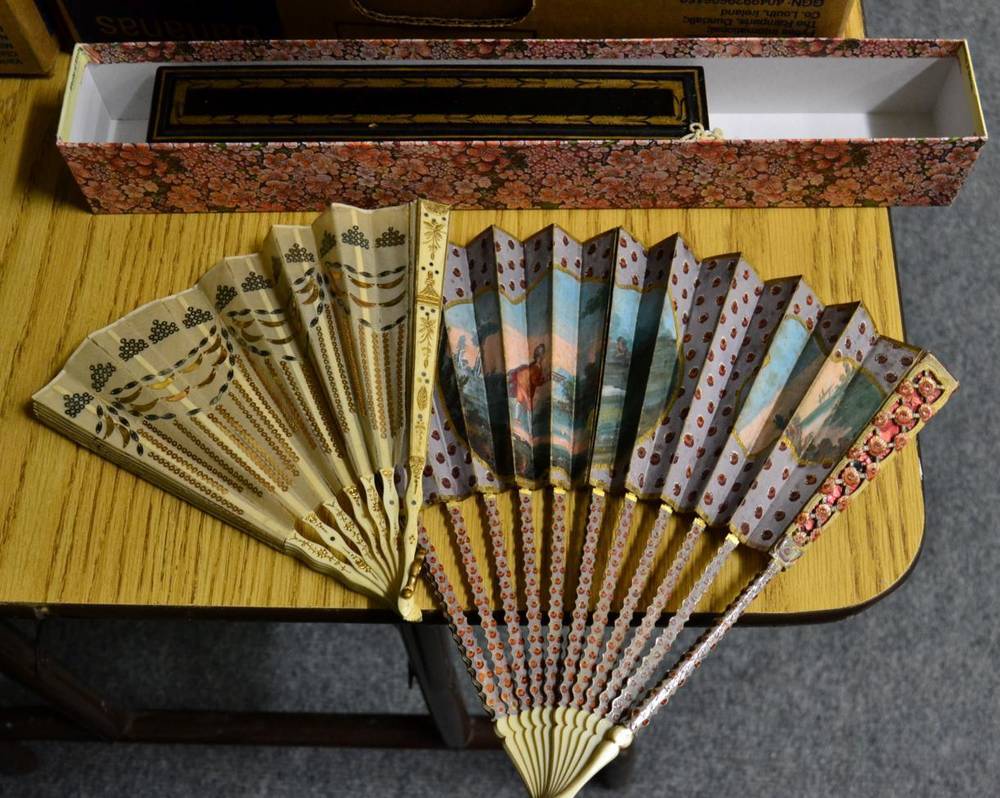 Lot 1101 - A mid 18th century ivory fan, the double paper leaf painted pale lilac, the gorge sticks...