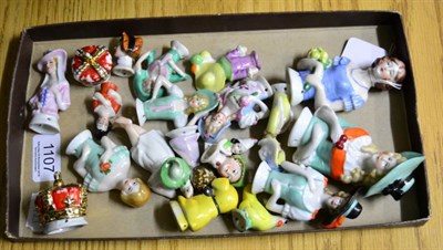 Lot 1107 - Assorted china half dolls in various sizes, Bonzo dog and a chicken, two crowns, heads etc (20)