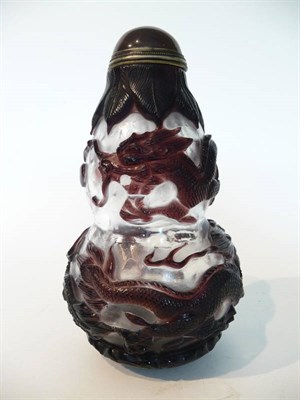 Lot 246 - A Chinese Amethyst Overlay Glass Large Double Gourd Snuff Bottle, 20th century, each bulb...