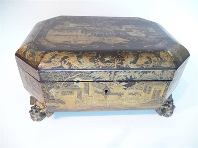 Lot 257 - A Chinese Export Lacquer Octagonal Workbox, circa 1820-40, decorated with views over a palace...