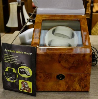 Lot 1293 - An automatic watch winder