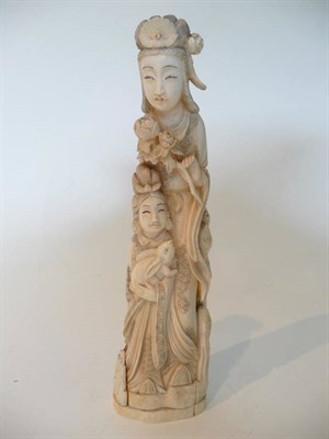 Lot 265 - A Japanese One-Piece Carved Walrus Tusk Figural Okimono, late Meiji period (1868-1912), as a...