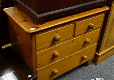 Lot 1365 - A pine three height chest of drawers