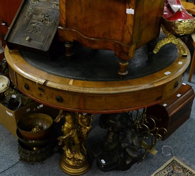 Lot 1366 - A circular mahogany rent type table, fitted with four drawers, two with numbered plaques, two...