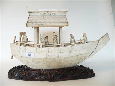 Lot 270 - A Japanese Walrus Ivory Model of the Takarabune, circa 1910, the canopied deck shading the...