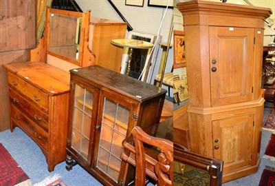 Lot 1377 - A pine cupboard; a dressing table and a bookcase