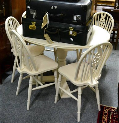 Lot 1391 - Cream painted circular table; and six Windsor style kitchen chairs