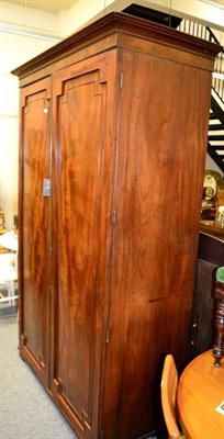 Lot 1396 - An early 19th century Gillows style mahogany double door wardrobe