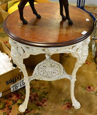 Lot 1419 - A white painted cast iron pub table