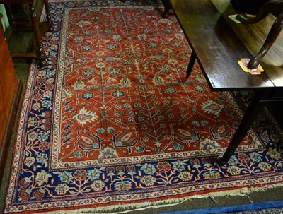 Lot 1447 - Single Mahal Carpet, West Iran, the blood red field of angular vines enclosed by indigo...