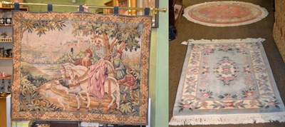 Lot 1448 - Machine made tapestry depicting a hunting scene together with two carved Chinese rugs (3)