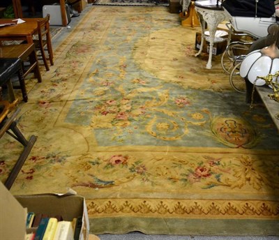 Lot 1456 - Templetons machine made carpet of Savonnerie design, the steel grey field centred by a cream...