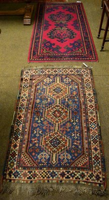 Lot 1457 - Khamseh rug, South West Iran, the mid indigo field with three medallions enclosed by ivory borders