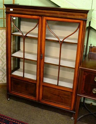 Lot 1486 - An Edwardian glass display cabinet