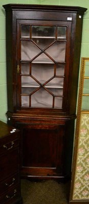 Lot 1488 - George III oak glazed hanging corner cupboard; and a George III oak hanging corner cupboard...