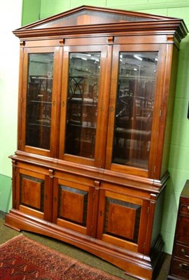 Lot 1490 - Modern mahogany and ebony crossbanded three door glazed bookcase