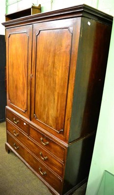 Lot 1491 - George III mahogany linen press, the interior with four sliding trays