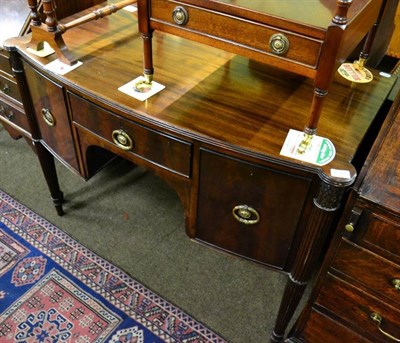 Lot 1511 - A mahogany bowfront sideboard of Gillows influence