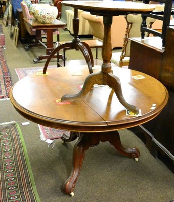 Lot 1520 - A Victorian circular tilt top breakfast table; and a tilt top tripod table (2)