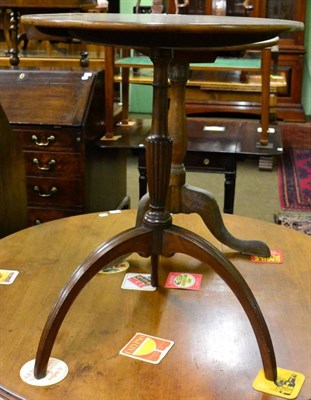 Lot 1521 - Early 19th century mahogany tilt-top tripod table with fluted stem and down swept supportsÂ