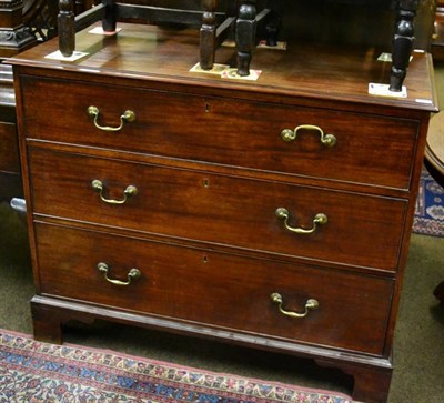 Lot 1522 - A mahogany three height chest of drawers