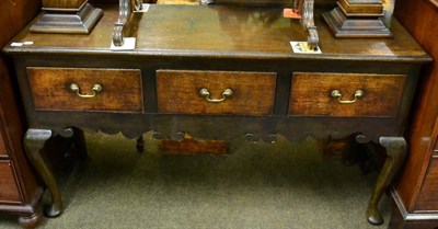 Lot 1525 - A part-18th century oak three drawer dresser base