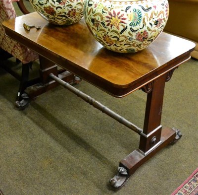 Lot 1535 - A Victorian mahogany library table, with turned stretcher