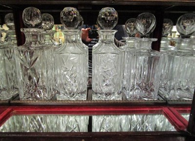 Lot 1542 - A mahogany table top cocktail cabinet containing four decanters, six whisky tumblers and six sherry