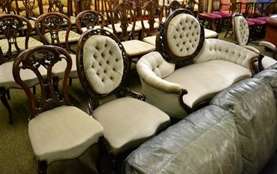 Lot 1558 - Victorian walnut framed seven piece drawing room suite comprising serpentine shaped sofa, armchair