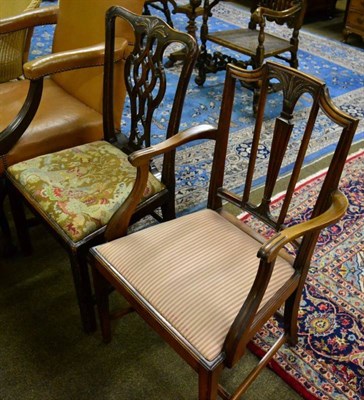 Lot 1562 - A mahogany Chippendale style chair with Gothic shaped splats, outswept arms and drop-in seat,...