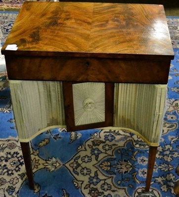 Lot 1567 - An early 19th century mahogany sewing table