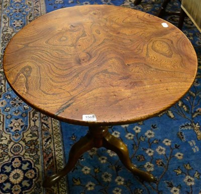 Lot 1568 - An 18th century burr elm tripod table