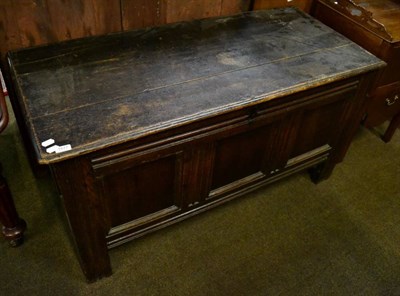 Lot 1577 - An 18th century panelled oak coffer