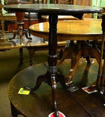 Lot 1581 - A George III mahogany tilt-top tripod table