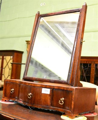 Lot 1594 - A George III crossbanded mahogany toilet mirror