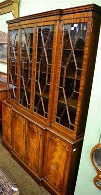 Lot 1603 - Reproduction mahogany four door breakfront bookcase