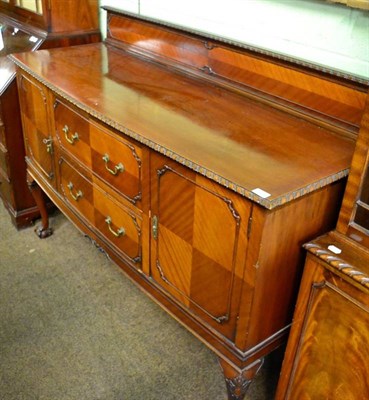 Lot 1604 - A 1930's mahogany sideboard on cabriole supports with ball and claw feet