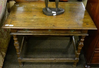 Lot 1617 - An 18th century oak side table with single drawer