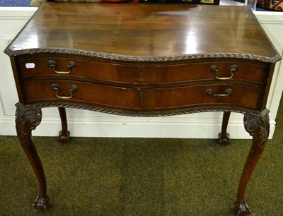 Lot 1627 - Mahogany two drawer serving table containing twelve place setting of Sheffield plated cutlery