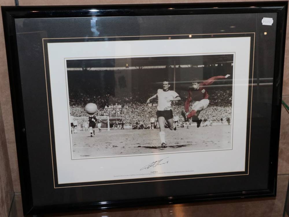 Lot 3022 - Geoff Hurst Signed Photograph showing Hurst scoring the fourth goal in the 1966 World Cup Final