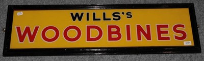 Lot 3157 - Wills's Woodbines Glass Advertising Sign black and red lettering on yellow ground 38x9 1/2'',...