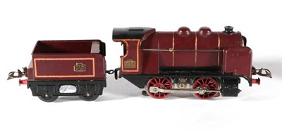 Lot 3210 - French Hornby O Gauge Electric 0-4-0 PLM Locomotive 020-311 Locomotive And Tender 28-511 maroon...