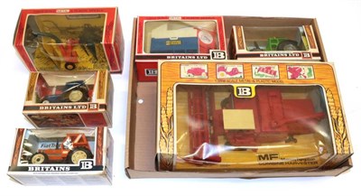 Lot 3361 - Britains Agricultural Vehicles 9570 Combine harvester, 9566 High sided tipper cart, 9542 Forage...