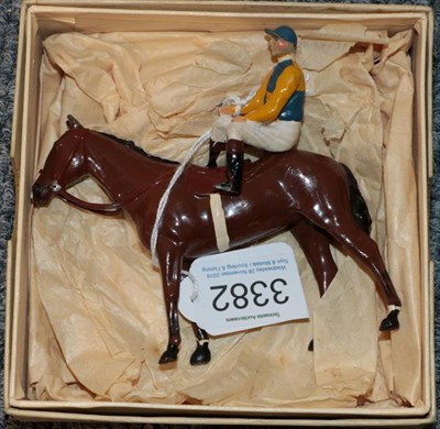 Lot 3382 - Britains Racing Colours Mr J V Rank yellow/blue quartered silks, blue cap on bay (G box G)