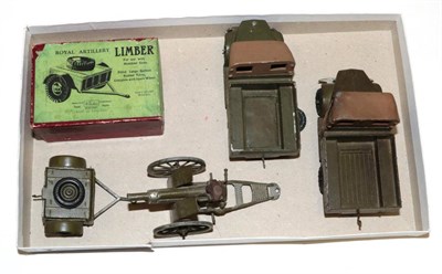 Lot 3384 - Britains Two Beetle Lorries together with an RA Limber (boxed) and a Fiedl gun (all G) (4)