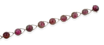 Lot 2008 - A Watermelon Tourmaline Bracelet by Åke Strömdahl, round cabochons in rubbed over settings...