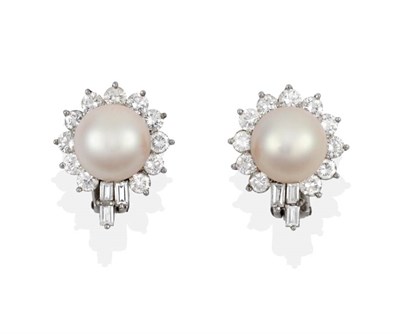 Lot 2010 - A Pair of Cultured Pearl and Diamond Cluster Earrings, cultured pearls within borders of round...