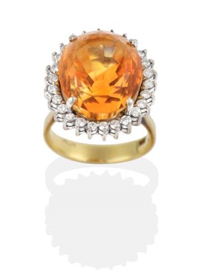 Lot 2017 - A Citrine and Diamond Cluster Ring, a round mixed cut citrine within a border of round...