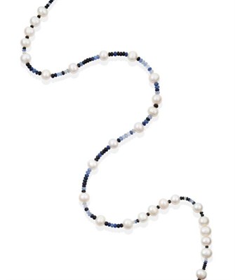 Lot 2018 - A Sapphire and Cultured Pearl Necklace, faceted shaded sapphire beads spaced by cultured...